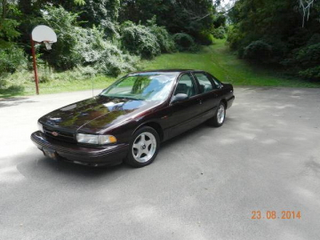 Illustration for article titled For $8,800, This 1995 Chevy Impala SS Is A Six Shooter